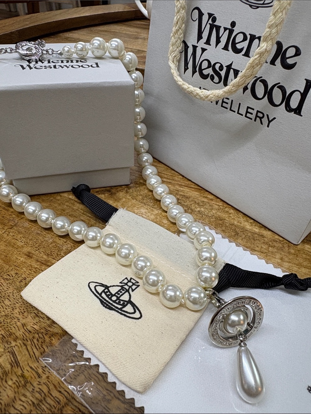 Vivienne Westwood Pearl Necklace with Silver Orb and Teardrop